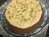 Egg free coffee cake topped with cream & pistachio