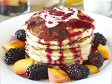 Orange buttermilk pancake with blackberry maple syrup