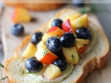 Goat Cheese Crostini with Blueberry and Peach Thyme Salsa