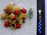Anelli con melanzane perline , pomodorini di Pachino igp e polvere di capperi