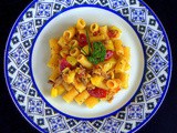 Cannerone con la renga , patate e pomodori datterini semisecchi