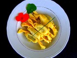 Caramelle di pasta fresca con pollo e peperoni