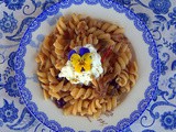 Fusilli con caponata tropeana , stracciatella pugliese e polvere di pistacchio