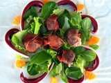 Insalata multicolor con bocconcini di castagne e fiocco di prosciutto