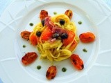 Linguine con pomodori datterini gialli, capperi e coppa piacentina dop