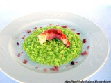 Risotto al pesto di pistacchio con gamberi bordati con fiocco di prosciutto