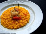 Risotto alla zucca con sentori di tartufo e capesante flambées