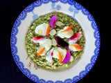 Risotto allo sciopetin , con stracchino primolight Tomasoni , fiori e mandorle