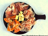 Tagliere di salumi piacentini con zucca in saor e formaggio montasio