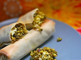 Chimichurri and feta spiked mung bean sprouts in a baked, jumbo spring roll