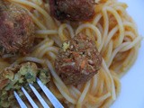 Indo-Chinese vegetable balls on spaghetti in a butternut squash and chilli sauce