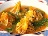 Masala mushroom wontons in a curried soya bean soup