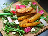 Miso-tamarind roasted potatoes wedges with locally sourced, garden salad items