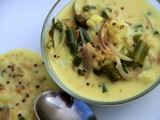 Mixed grains and vegetables in a tangy and fragrant coconut kadhi