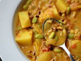 Potato, edamame bean and pine nut curry in a spiced yoghurt gravy