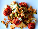 Slow roasted tomato, channa dal, feta and courgette ribbon spicy salad