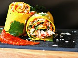 Stuffed Khandvi rolls with slow roasted tomato, garlic and fennel sauce
