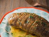 Slow Cooker Hasselback Potatoes with Honey-Sriracha Butter