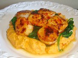 Seared scallops with sweet potato puree and garlic sauteed spinach