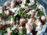 Dahi Vada / Lentils balls in a seasoned yogurt