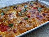 Baked gnocchi with meatballs, tomato and mozzarella