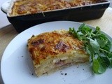 Potato hummous and caramelised onion gratin