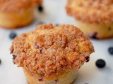 Bakery style buttermilk blueberry muffins with crumb topping