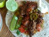 Mexican pulled beef with baby qukes, tiny tomatoes and salsa