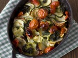 Tian di patate zucchine e pomodori con pesto al basilico