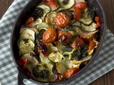 Tian di patate zucchine e pomodori con pesto al basilico