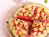 Watermelon Pizza with assorted Fruits & Chocolates