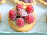 Lime, white chocolate curd and raspberry tartlets on Sablé Breton