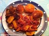 Cooked up corned beef, fried dumplings and fried plantains