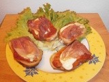 Bruschetta with a tomato sauce, raw ham and mozzarella