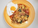 False ratatouille of several vegetables and fried eggs