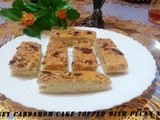 Honey Cardamom Cake Topped With Pecan Nuts