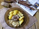 Tombarello al forno con patate e cipolle