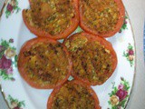 Baked Stuffed Tomato loaded with veggies / cheese / nuts