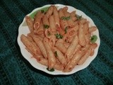 Penne pasta with tamoto and besil