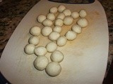 Gulab Jamun with Coconut Flakes / Sweet Indian Donuts with Coconut Flakes