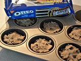 Chocolate chip cookie cups stuffed with oreos