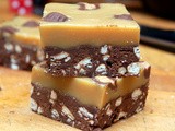 Double chocolate & salted caramel pretzel fudge topped with peanut butter cups