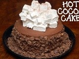 Flourless, triple layer, hot chocolate cake with homemade marshmallows & crushed butterfingers