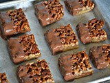 Pecan Pie Bars Dipped in Milk Chocolate & Drizzled with Dark Chocolate