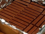 Quadruple layer chocolate cheesecake kit kat bars