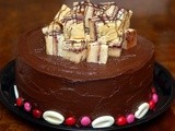 Quadruple layer chocolate raspberry cake & cheesecake topped with chocolate ganache frostng & white chocolate raspberry bars