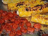 Roasted corn, tomato & pepper soup topped with pesto & avocado