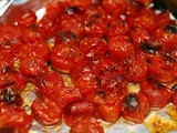 Roasted grape tomatoes with freshly sliced parmesan cheese
