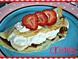 Strawberry and nutella banana crepes with whipped cream