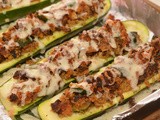 Zucchini boats stuffed with bacon, breadcrumbs & cheese